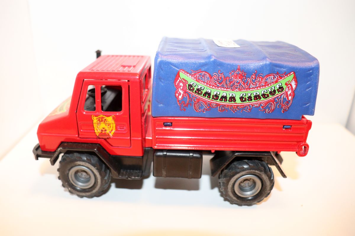 Welly SW21465, Mercedes Benz Unimog 1750 + Zirkuswagen, "Caesar Circus", blau/rot mit Tieren