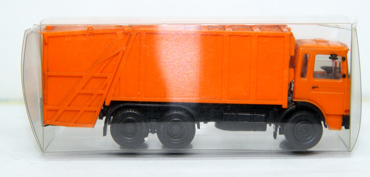 Herpa  LKW MAN Müllwagen, orange, für Spur H0, in Ersatzverpackung