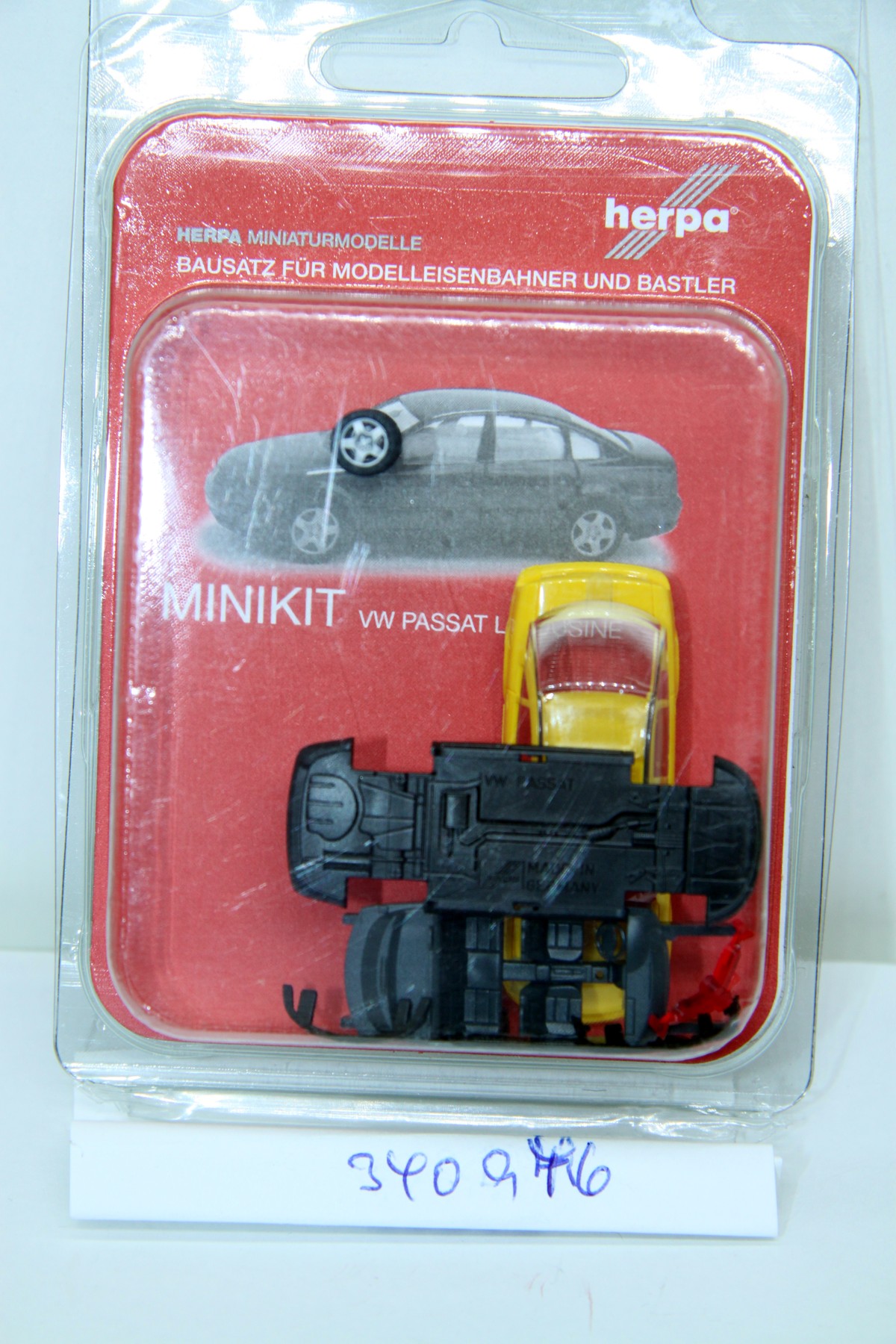 Herpa 340946, Minikits, VW Passat Limo yellow,, for H0 gauge, with original box.