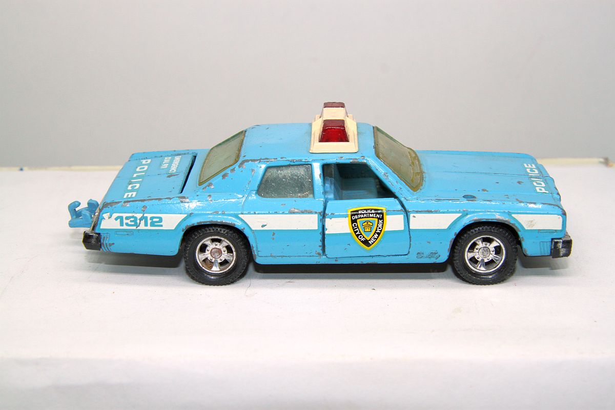 Matchbox SW19810, Super Kings, Pymouth Gran Fury, blue, used, with signs of wear,