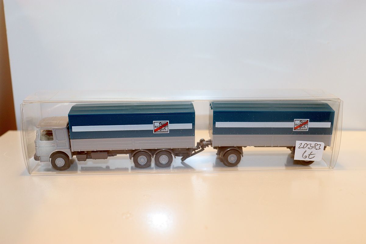 Wiking SW20383, Wiking 470 MAN 22.320 flatbed trailer truck gray/blue “fern schnell gut” for H0 gauge
