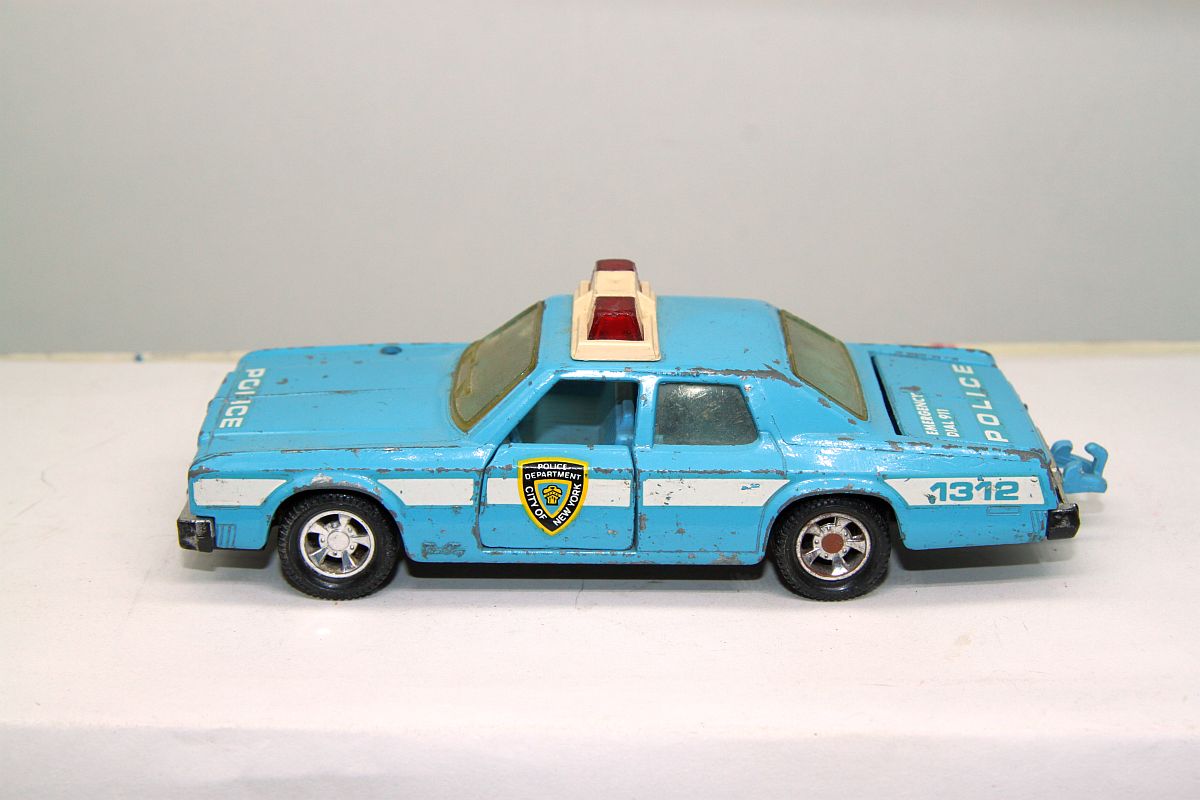 Matchbox SW19810, Super Kings, Pymouth Gran Fury, blue, used, with signs of wear,