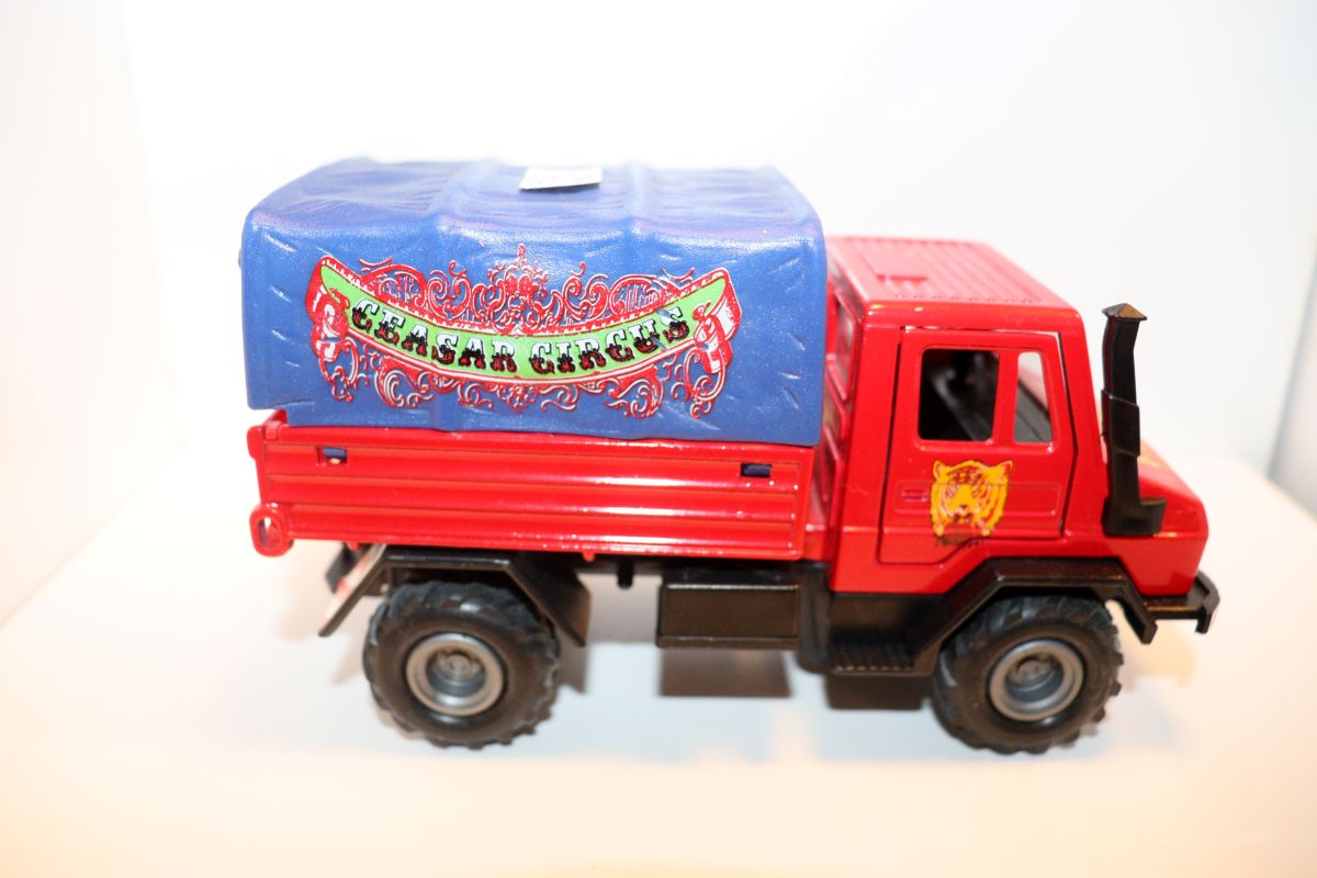 Welly SW21465, Mercedes Benz Unimog 1750 + Zirkuswagen, "Caesar Circus", blau/rot mit Tieren