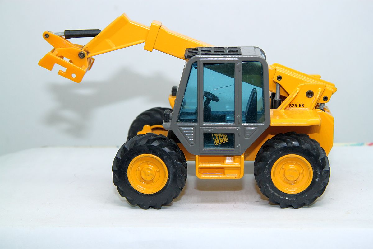 Joal SW19819, construction vehicle model, scale 1:35, orange, used, with signs of wear, 
