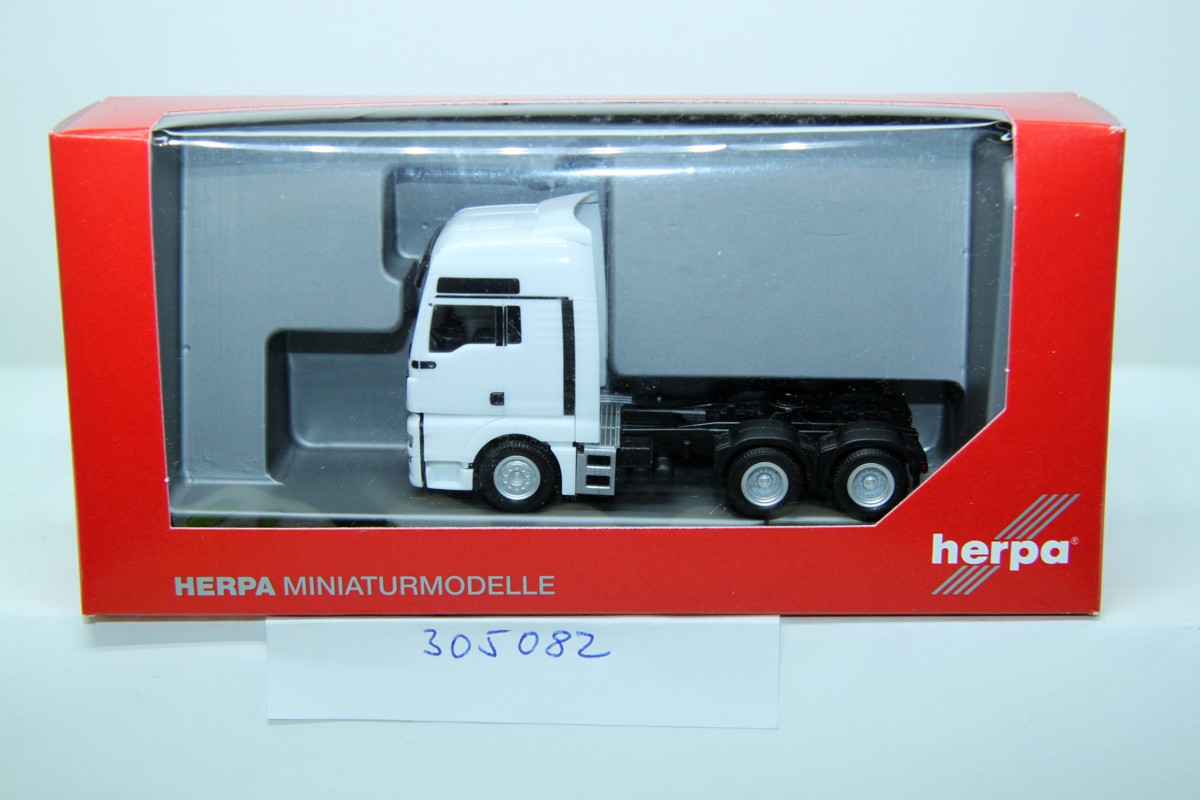 Herpa 305082, MAN TGX XXL, Euro 6 6x4, tractor, white, for H0 gauge, with original packaging